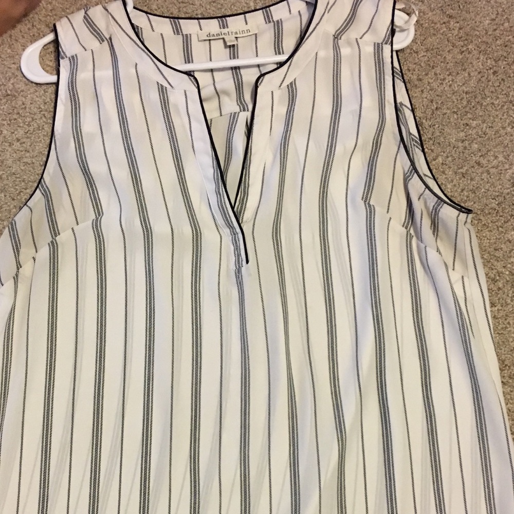 Black and white sleeveless blouse